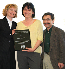 Rachel Westlake, Dean of Math and Computer Science, left, and Despina Prapavessi, center, receive 2007 HP Technology for Teaching Higher Education Leadership Grant