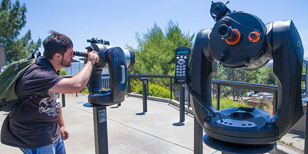 Student using telescope at DVC