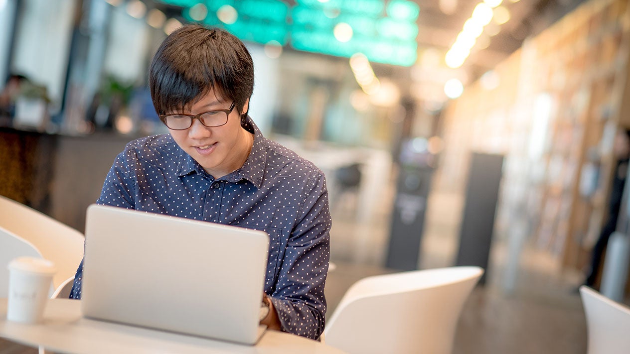 A student studies during a break from classes.