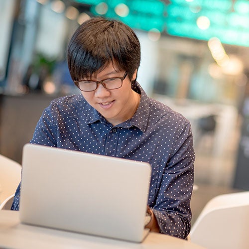A student studies during a break from classes.