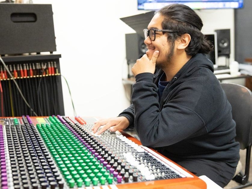 DVC music industry alum Chrei Torres in the DVC music studio