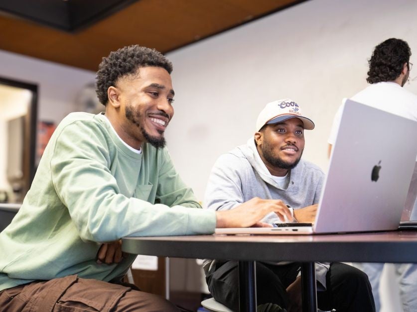 DVC students using a laptop