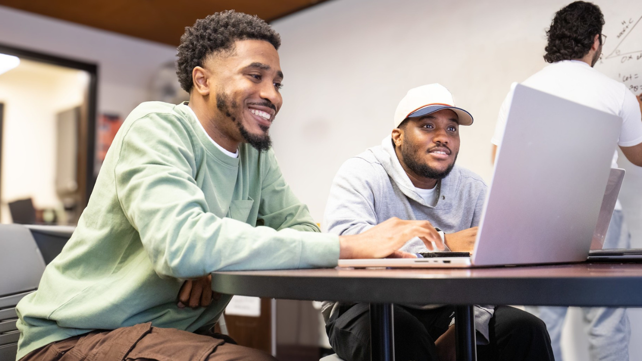Two students at computer