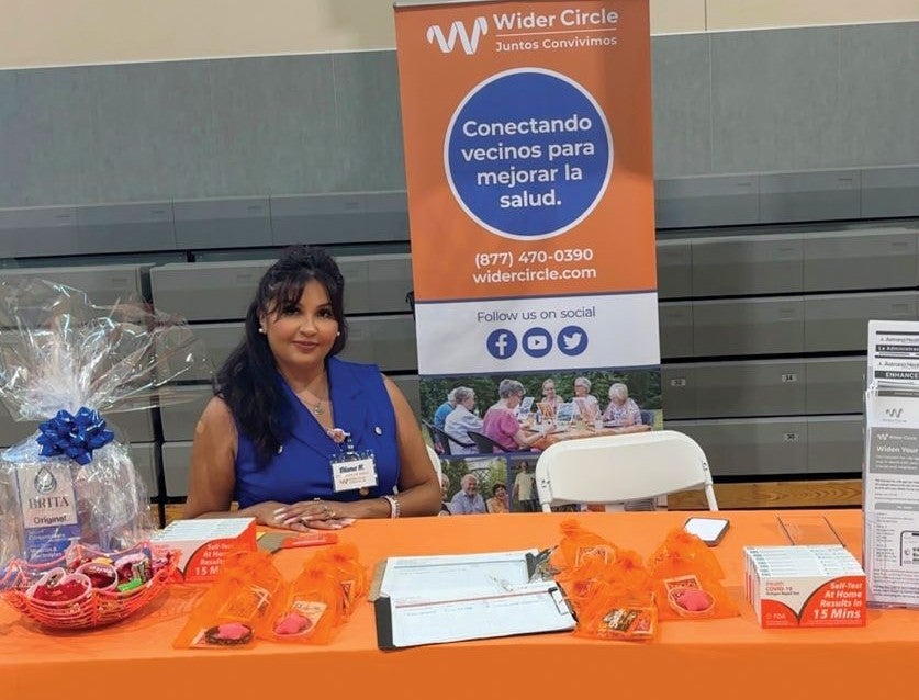 DVC alum Diana Hernandez on the job for her employer, Wider Circle.