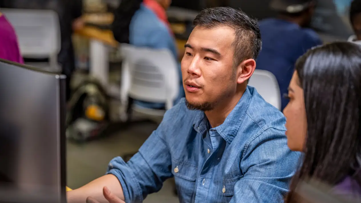 Teacher and student working online.