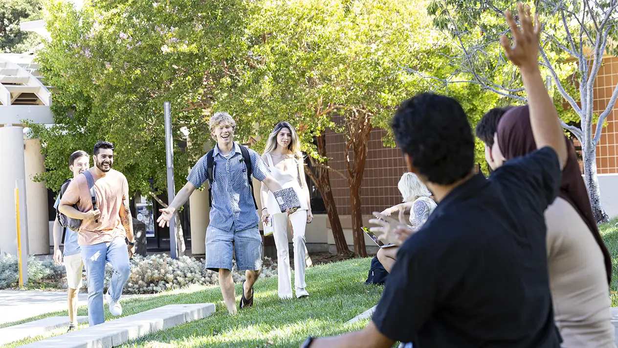 DVC students greet each other.