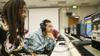 DVC music industry study students sitting in front of their piano keyboards