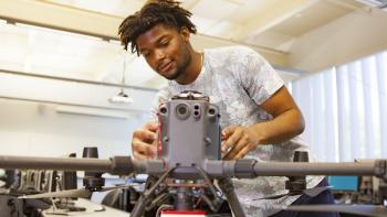 DVC drone technology student working with his drone