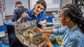 DVC electronics technology students working on a project