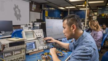 DVC electronics technology student working on a project