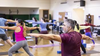 Yoga training students in class