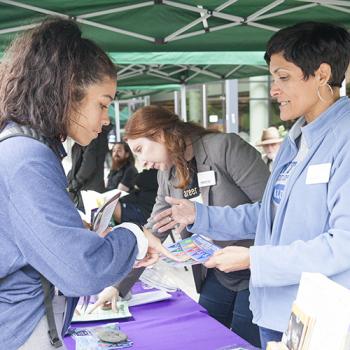 DVC students at a booth at an event on campus