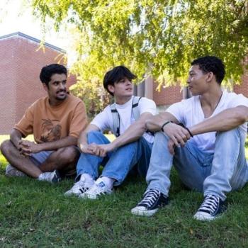 Three students talking