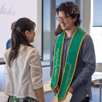 A DVC international student at a graduation ceremony.