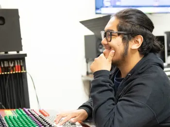 DVC Student at mixing board.